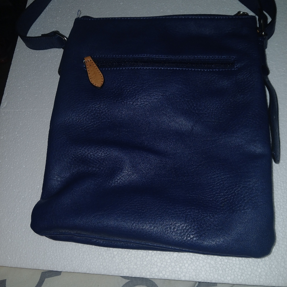 Charming Charlie brand, Hand bag, or shoulder bag. Adjustable strap.
